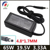 Black 65W 19.5V 3.33A AC adapter with a cable and connector tip.