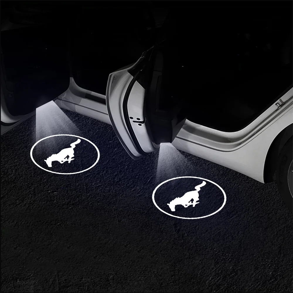 LED car door welcome lights illuminating the ground near a vehicle door.