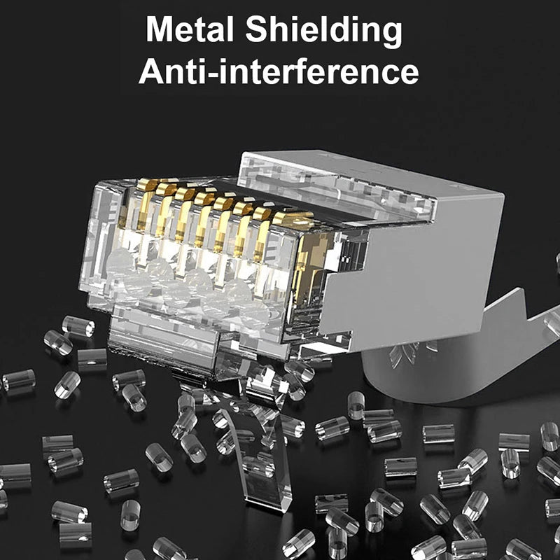 Close-up of metal shielding anti-interference modular RJ45 connectors and various clear plastic components.