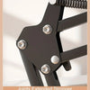 A close-up view of a black adjustable joint mechanism with a coiled spring, designed for stronger and more stable support.