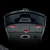 A close-up view of a black PTFE mouse skate with adhesive dots and a visible logo.