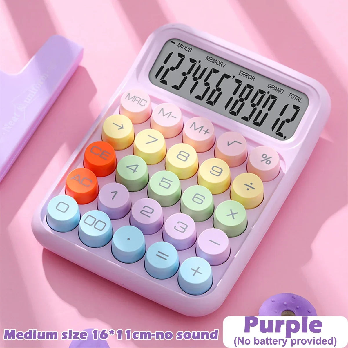 A purple 12-digit desktop calculator with mechanical keys and various colored buttons is shown on a pink background.