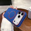 A hand holds a blue magnetic wireless charging phone case with a white back and multiple camera lenses on a wooden table.