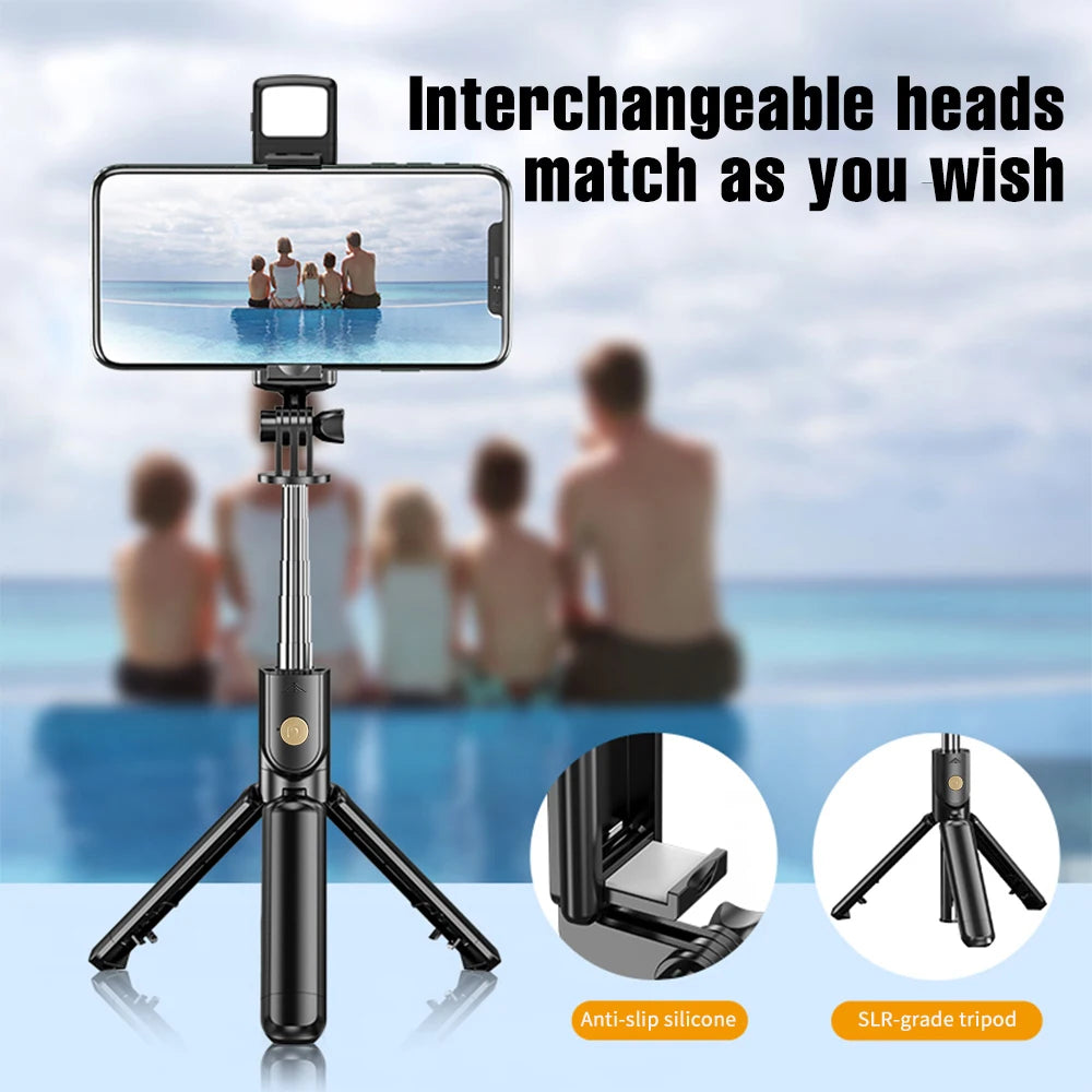 A black 3-in-1 selfie stick tripod with an interchangeable head, used for photography or video.