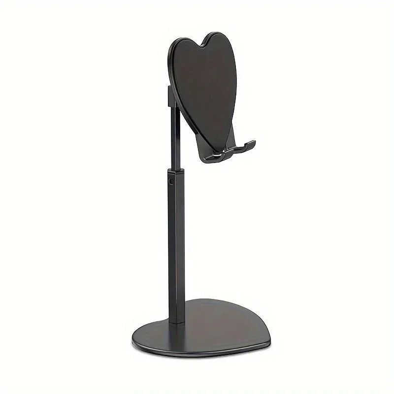 A black adjustable desktop phone and tablet stand with a heart-shaped holder.