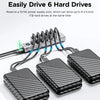 A set of six Orico hard drive enclosures connected to a power supply port for driving 6 hard drives simultaneously.