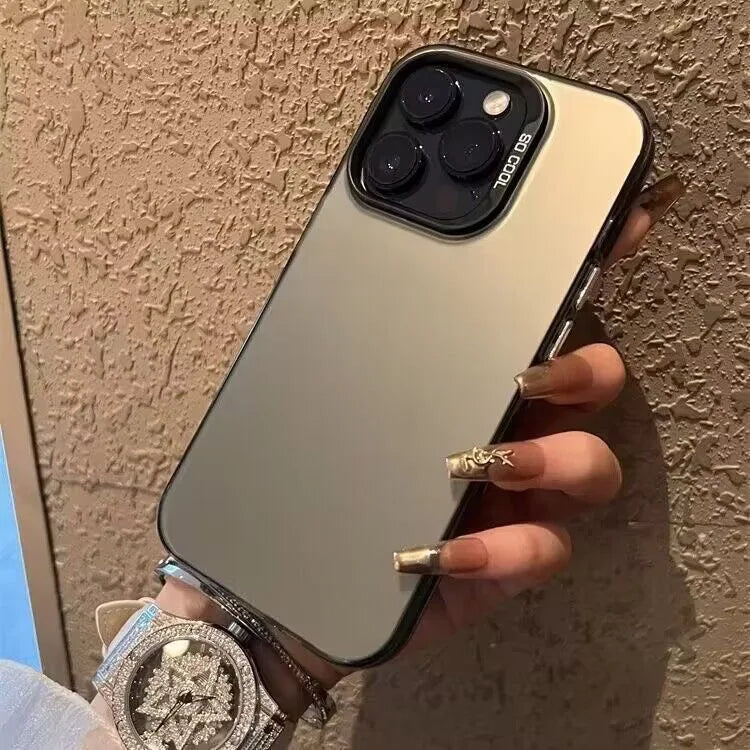 A hand holds a smartphone in a clear case against a textured wall, featuring a silver watch on the wrist.