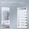 A set of six colored drawing pens and a grid paper sheet for sketching and art