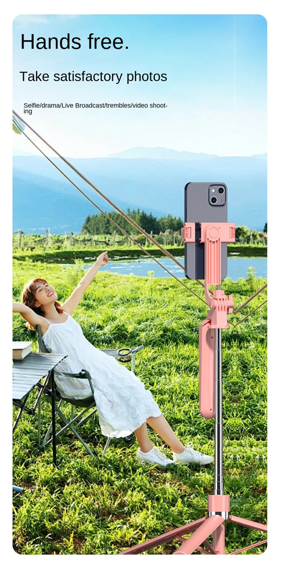 A woman taking a photo outdoors using a pink 360° rotation selfie stick with a smartphone.