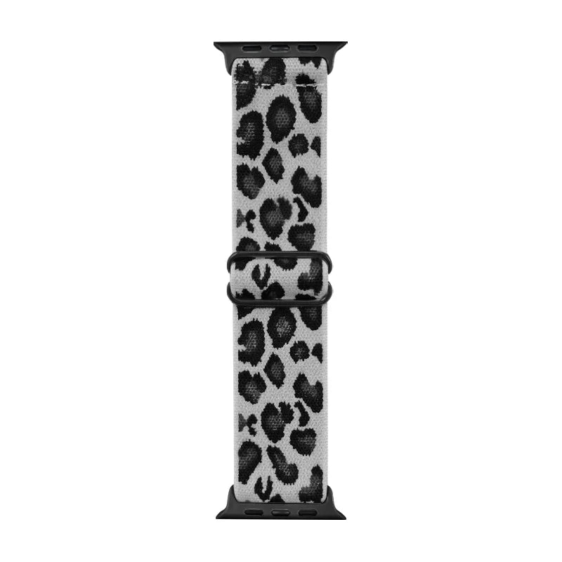 A black nylon apple watch band with a leopard print pattern.
