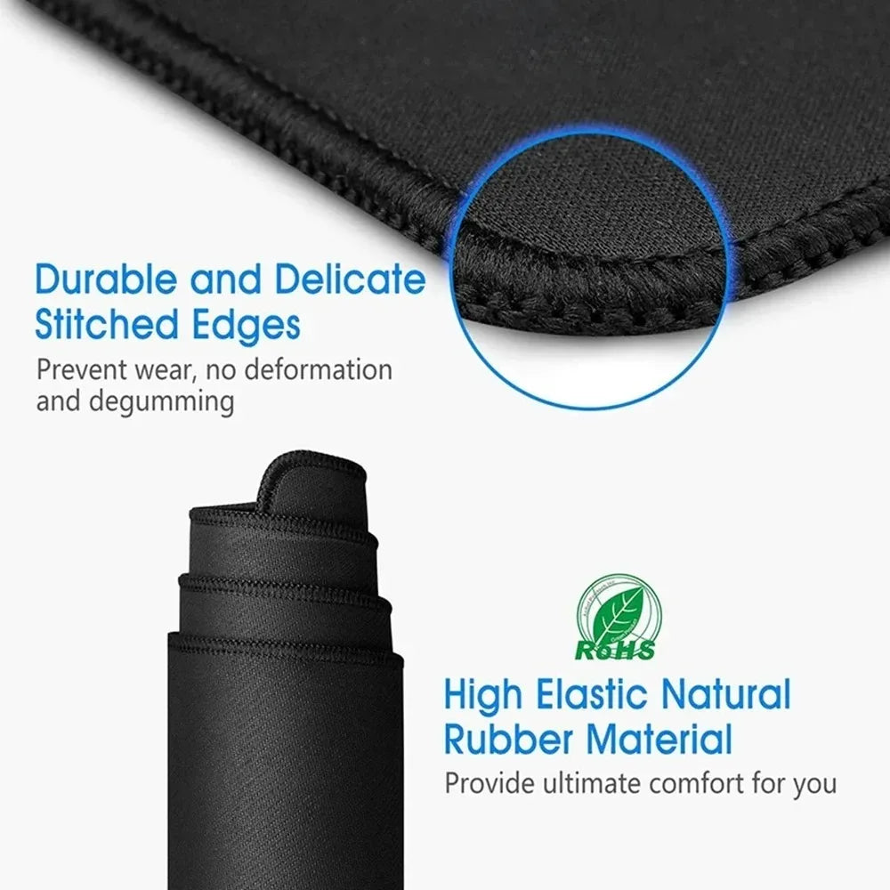 Close-up of a black mouse pad showing durable stitched edges and high elastic natural rubber material for comfort