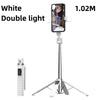 A white double light Bluetooth selfie stick tripod for phone photography.