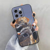 A hand holds a phone case featuring a realistic image of a golden retriever dog.