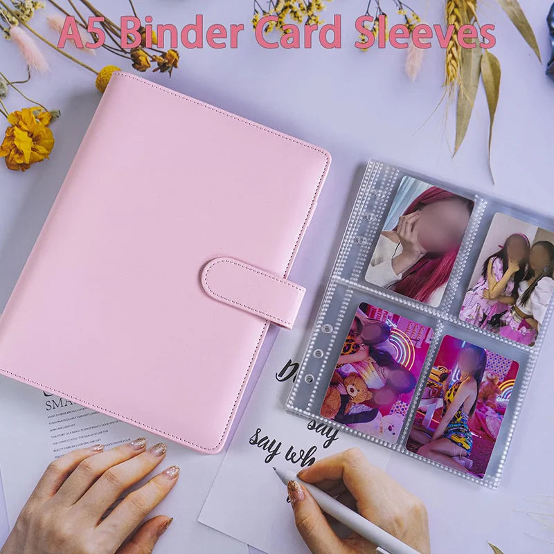 A pink A5 binder card sleeve is shown next to a clear plastic sleeve filled with photo cards and a hand writing on paper.