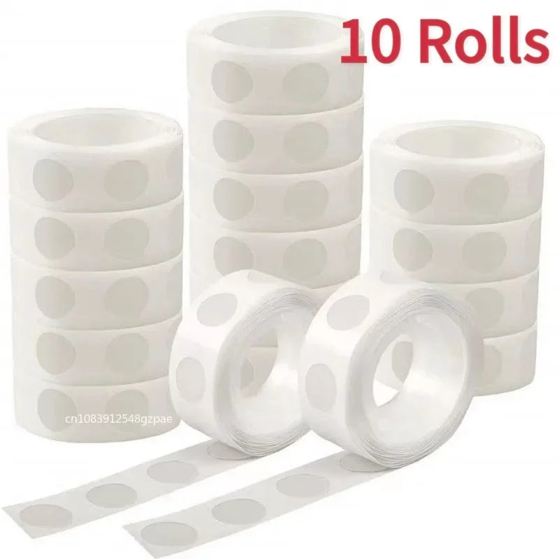 Ten rolls of clear double-sided adhesive dots for crafts and DIY projects