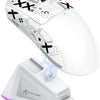 A white high-performance wireless gaming mouse with purple and green LED lighting is shown on a stand.