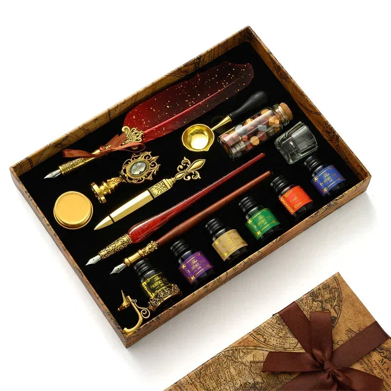 A luxury fountain pen set with various pens and a wax seal kit displayed in a wooden box.