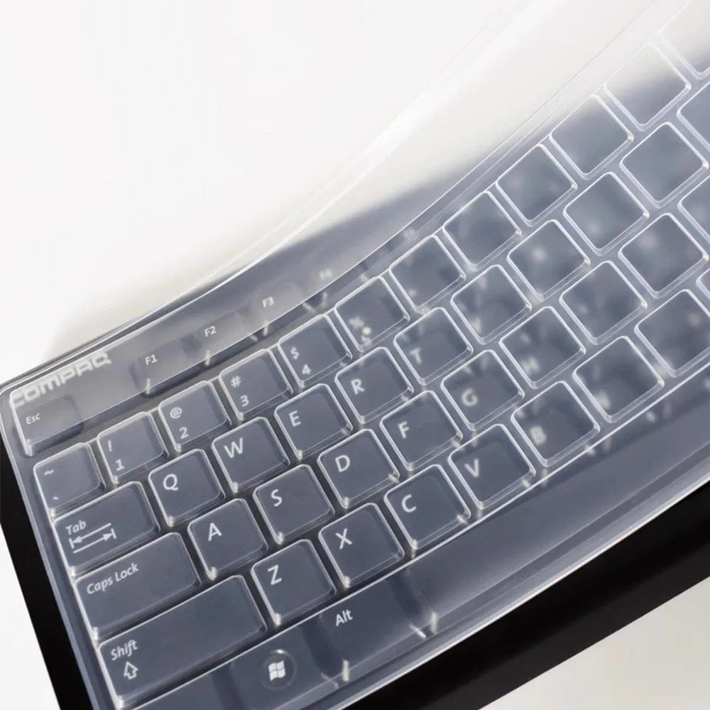 A close-up view of a clear silicone keyboard protector cover for a laptop keyboard.