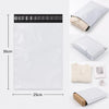 A white self-adhesive courier mailer bag with a black seal and a beige fabric pouch shown next to a folded white bag.