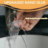 A hand is applying upgraded nano glue, a clear mesh tape, to a surface.