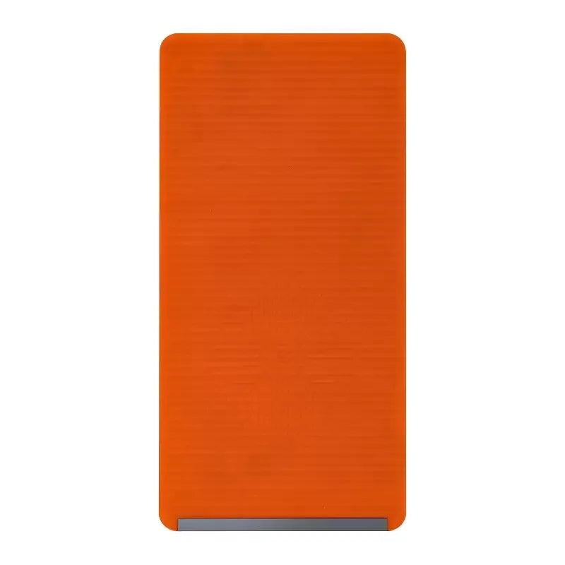 An orange silicone device stand with a metallic silver base.