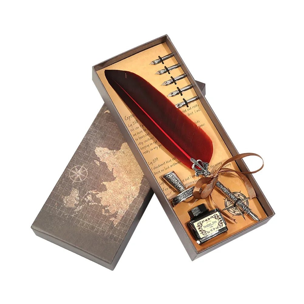 A wooden box containing a dip pen set with a leather-colored feather, several nibs, and an antique-style compass.