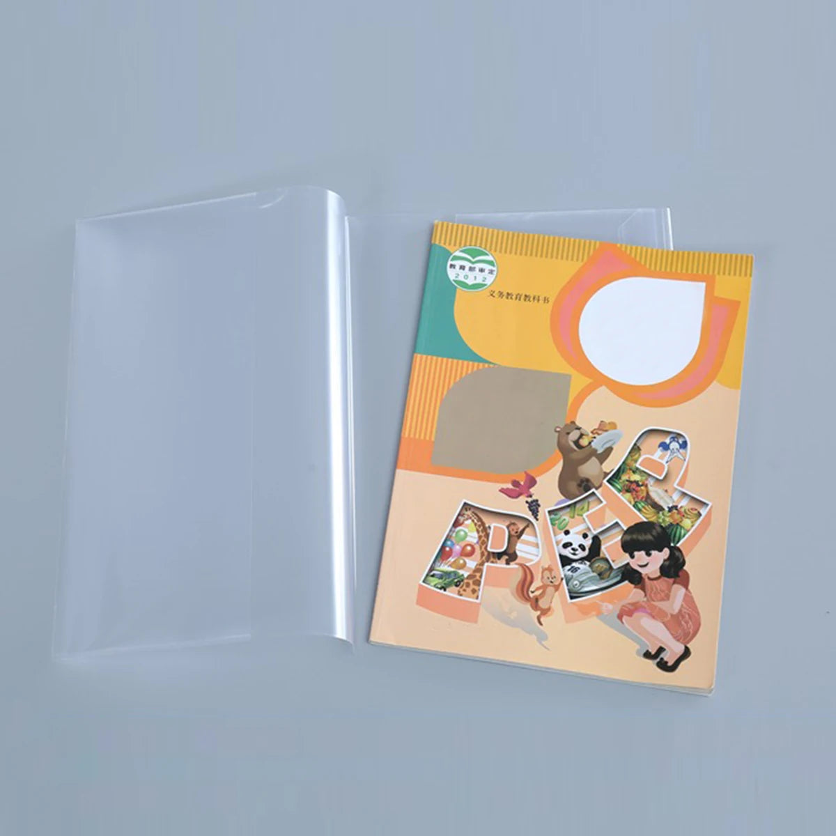 Cubierta protectora transparente para documentos A4 y 16K con ilustraciones coloridas.