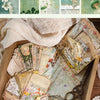 A collection of vintage and floral paper, including aged pages, dried flowers, and decorative elements for crafting.