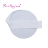 A white adjustable spandex elastic hair tie or trim rolled into a circular form.
