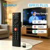Black wireless gyro air mouse remote with BT and voice control features displayed on a coffee table.