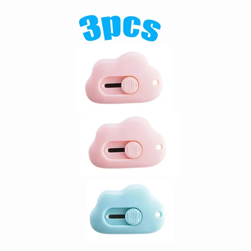 A set of three multi-color rabbit cloud utility knives in pink and light blue.