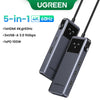 A black UGREEN 5-in-1 hub featuring an HDMI port, three USB-A ports, and a PD 100W charging output.