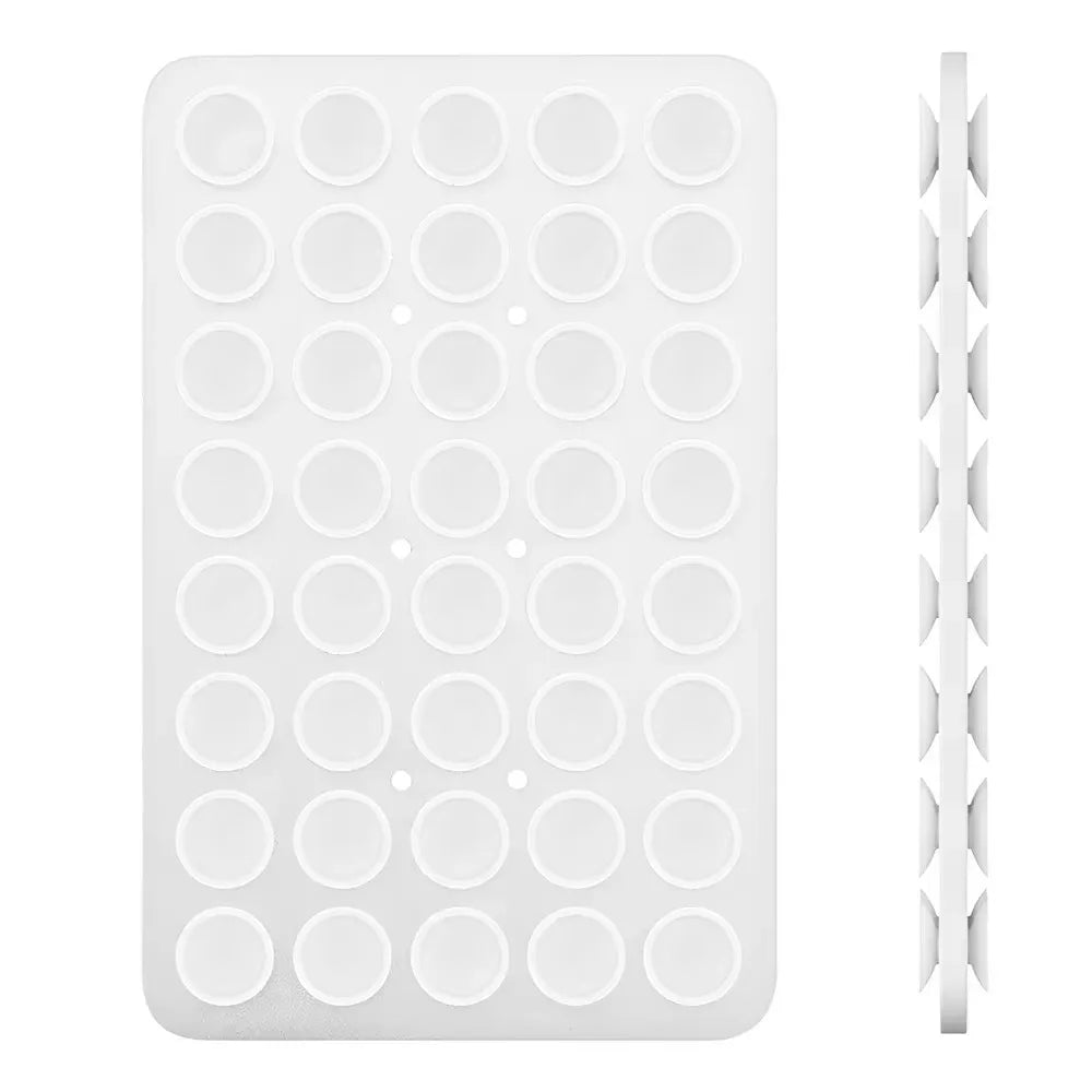 A white double-sided silicone phone mount grip with multiple circular holes for mounting devices.