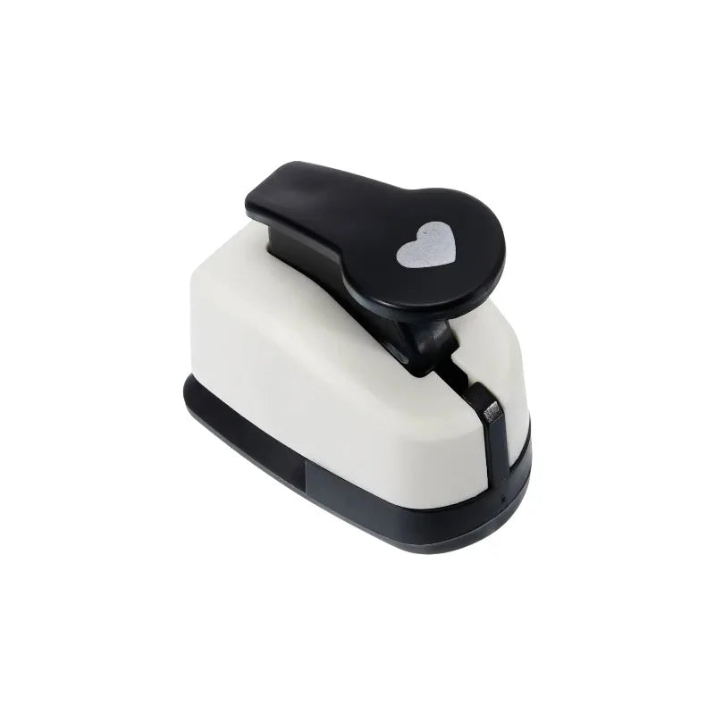 Herramienta de punzón de corazón blanco y negro de precisión para scrapbooking.