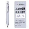 A white Uni-Ball One P pen is shown, featuring a gold clip and quick-dry ink.