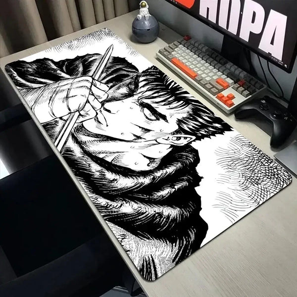 A large black and white anime drawing of a fierce character with long hair and a scarf on a gaming mouse pad.