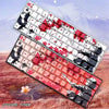 A set of anime themed PBT keycaps featuring red and white floral patterns for a mechanical keyboard