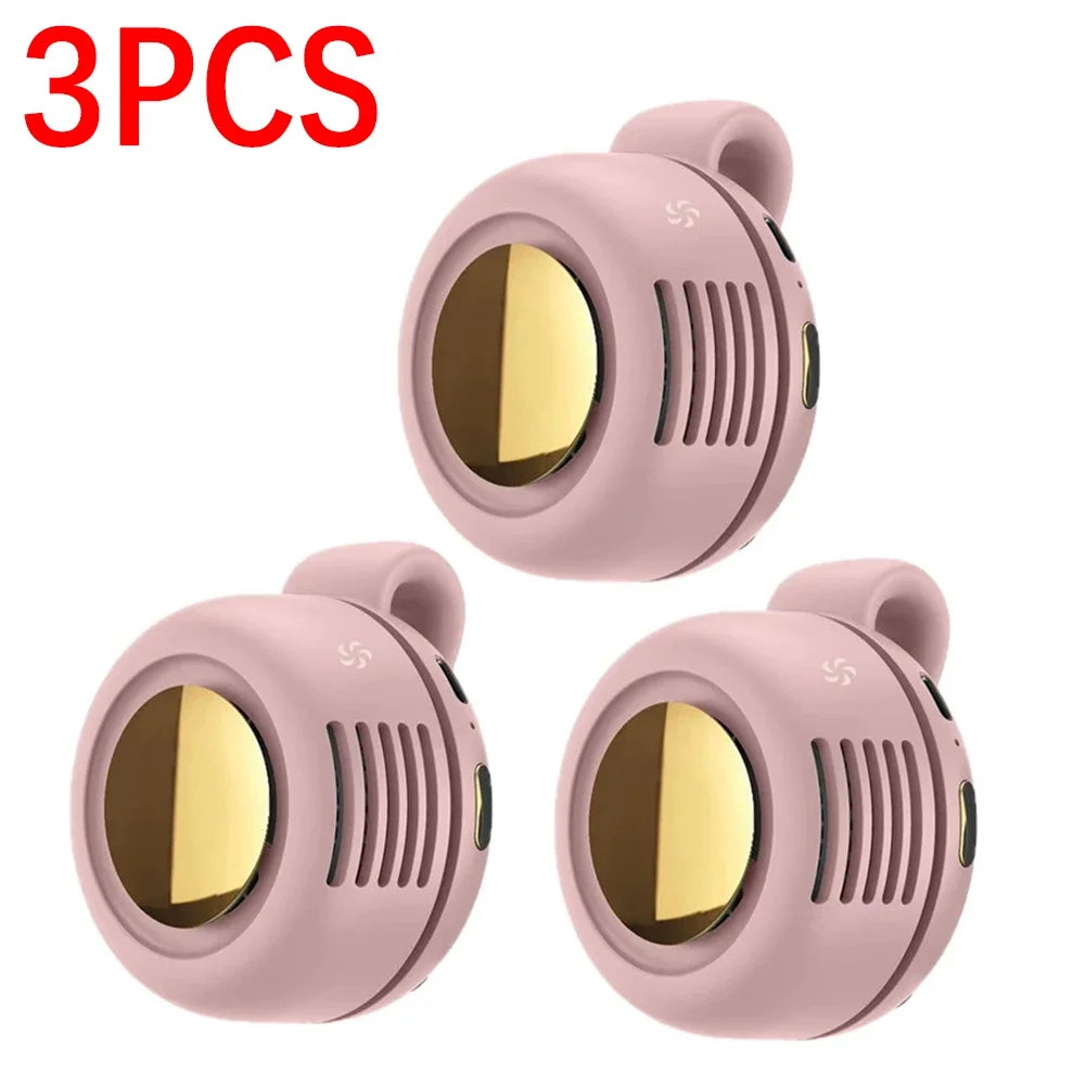 Three pink portable mini blade-less electric fans shown from the top view.