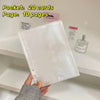 A clear plastic sleeve containing 20 cards and 10 pages is displayed on a white shelf.