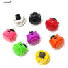 A collection of various colored arcade push buttons with micro switches shown from above.