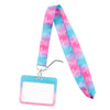 A pink and blue patterned fabric lanyard with a clear plastic tag attached for ID badges and accessories.