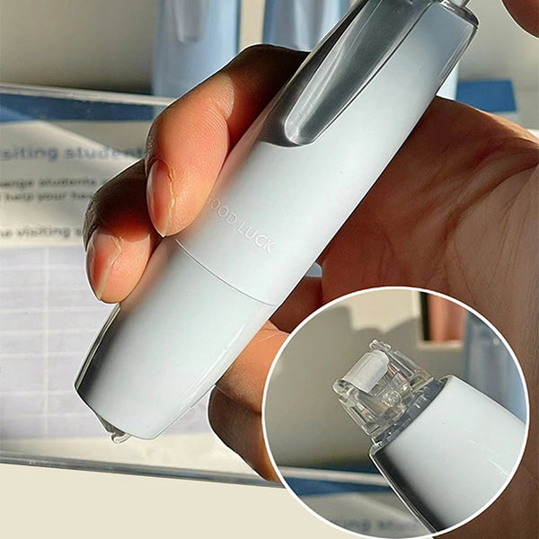 A hand holds a silver and white heavy duty double-sided adhesive tape dispenser, showing the tape roll.