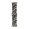 A fashion leopard print nylon Apple Watch band with a silver buckle.