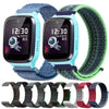 A set of blue and green nylon loop watch straps for a kids' watch, shown alongside the watch.