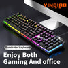 A close-up view of a black illuminated gaming keyboard with RGB lighting, placed on a dark surface.