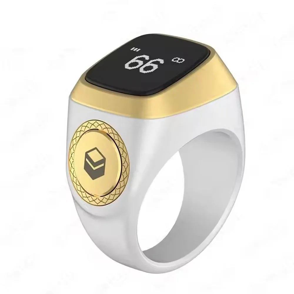 A gold and white digital ring with a black display showing 66, used for prayer counting.