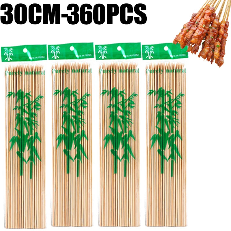 A set of natural bamboo skewers, ranging from 30cm to 360pcs, with green leaves attached.