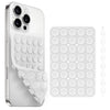 A white silicone suction cup phone holder with multiple suction cups and a matching silicone pad.