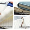 A close-up of an A5 retro leather notebook showing high quality paper and a bookmark tape.