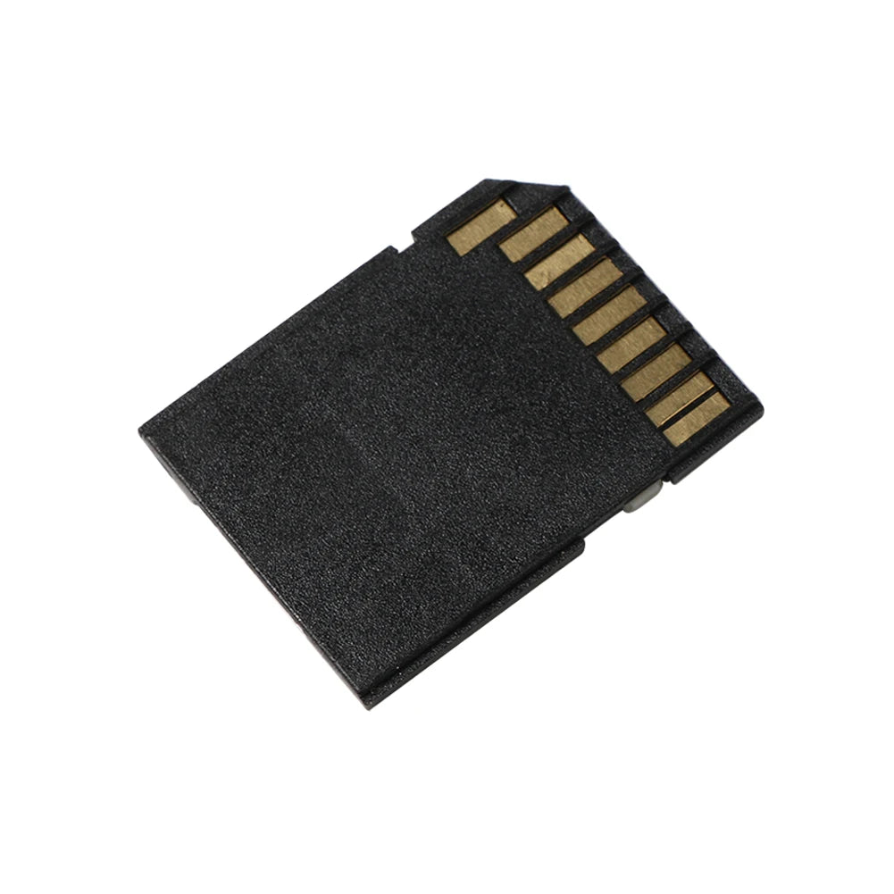 A black multi-function memory card adapter with gold contacts.
